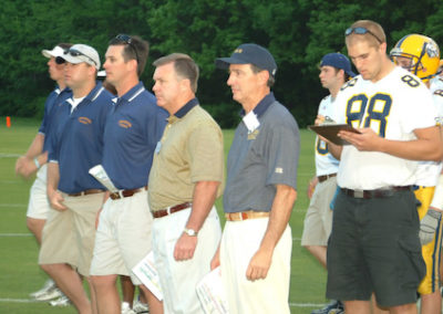 coaches on side of field